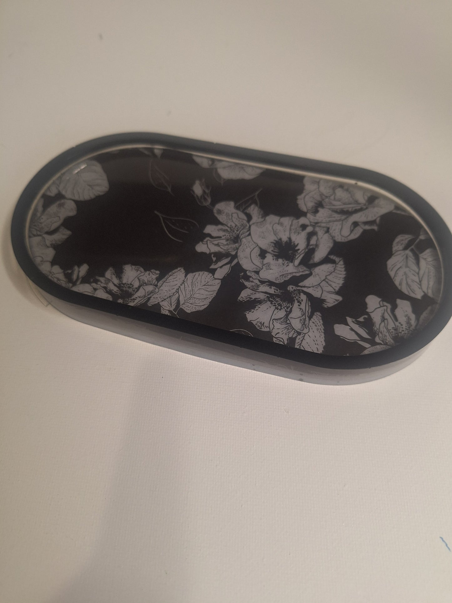 Vide poche noir et blanc